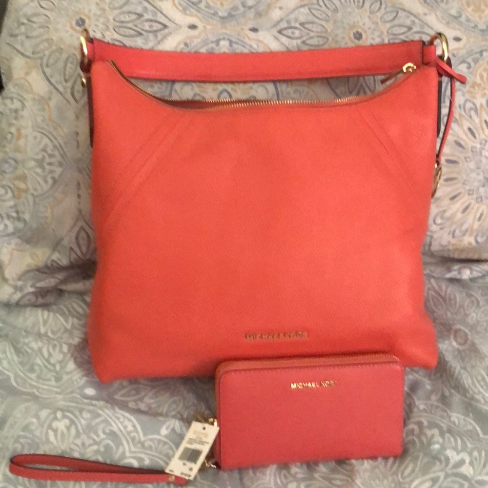 Michael Kors leather handbag with matching wallet